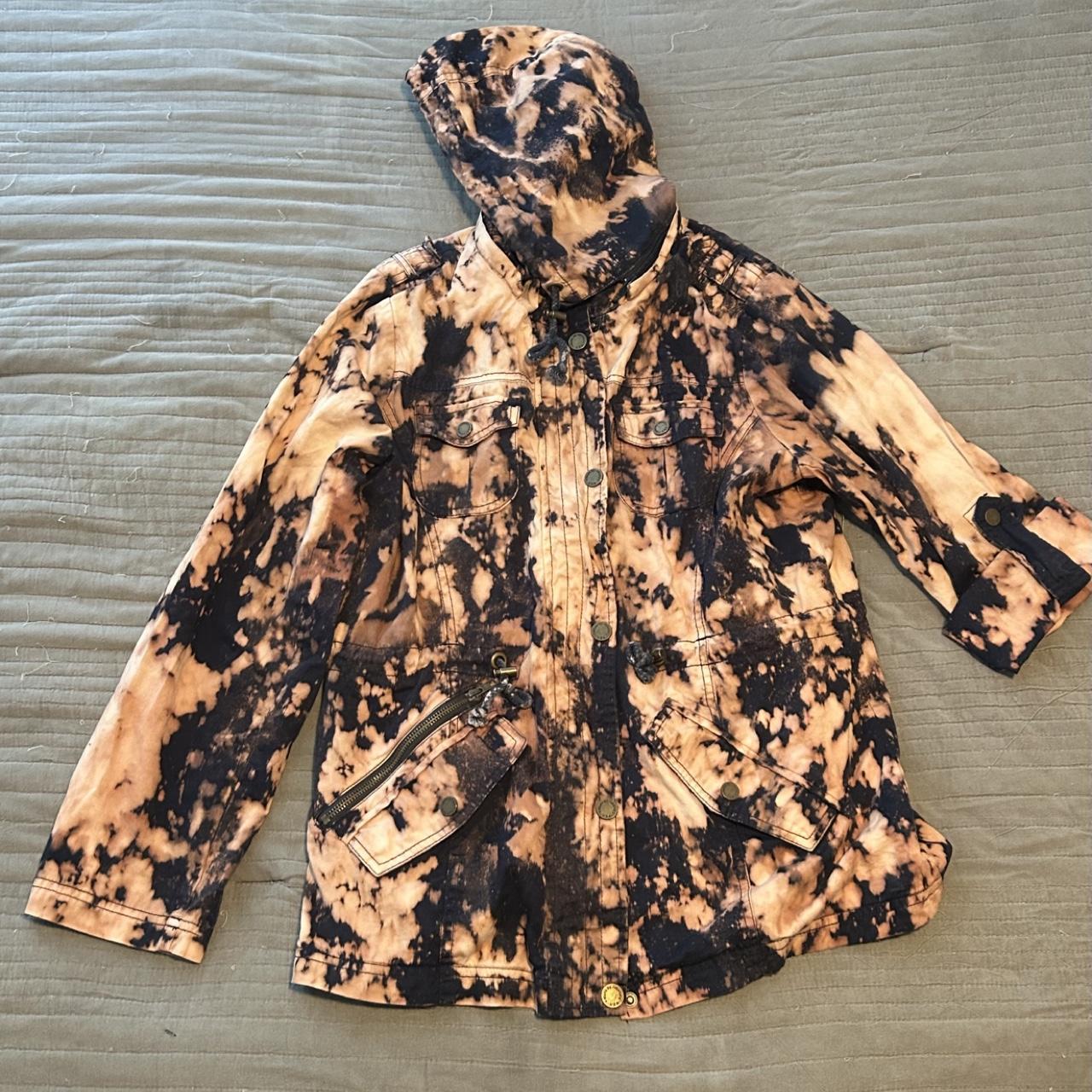 Original N Titled Depop photograph of a navy and peach bleach-dyed jacket with hood