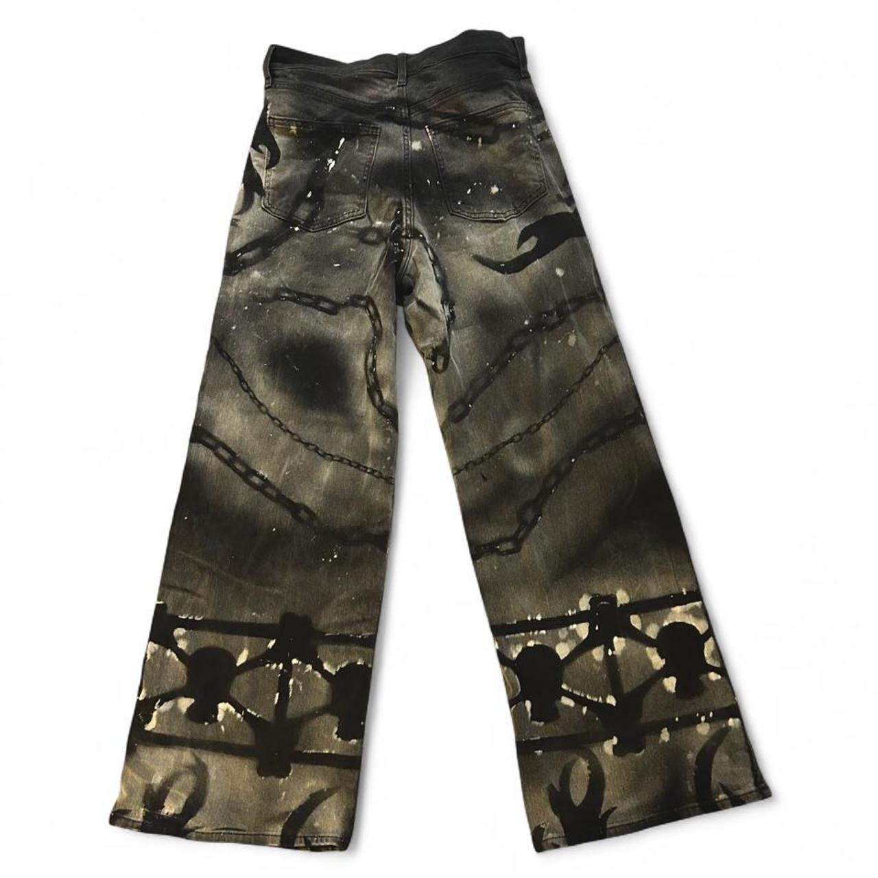 Original N Titled Depop photograph showing the back of black and gray graphic jeans